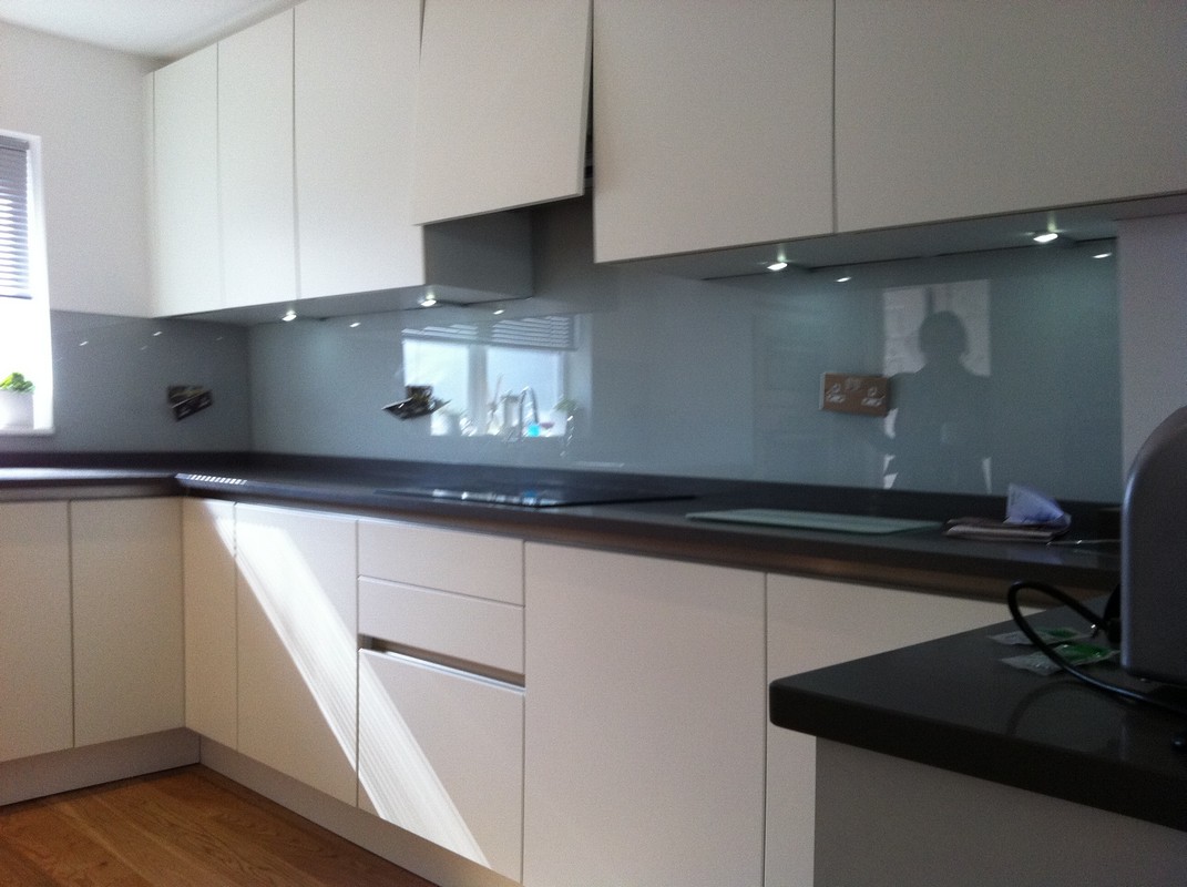 Grey glass kitchen splashback with LED lighting in Richmond